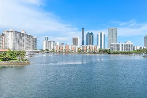 a view of ocean with city