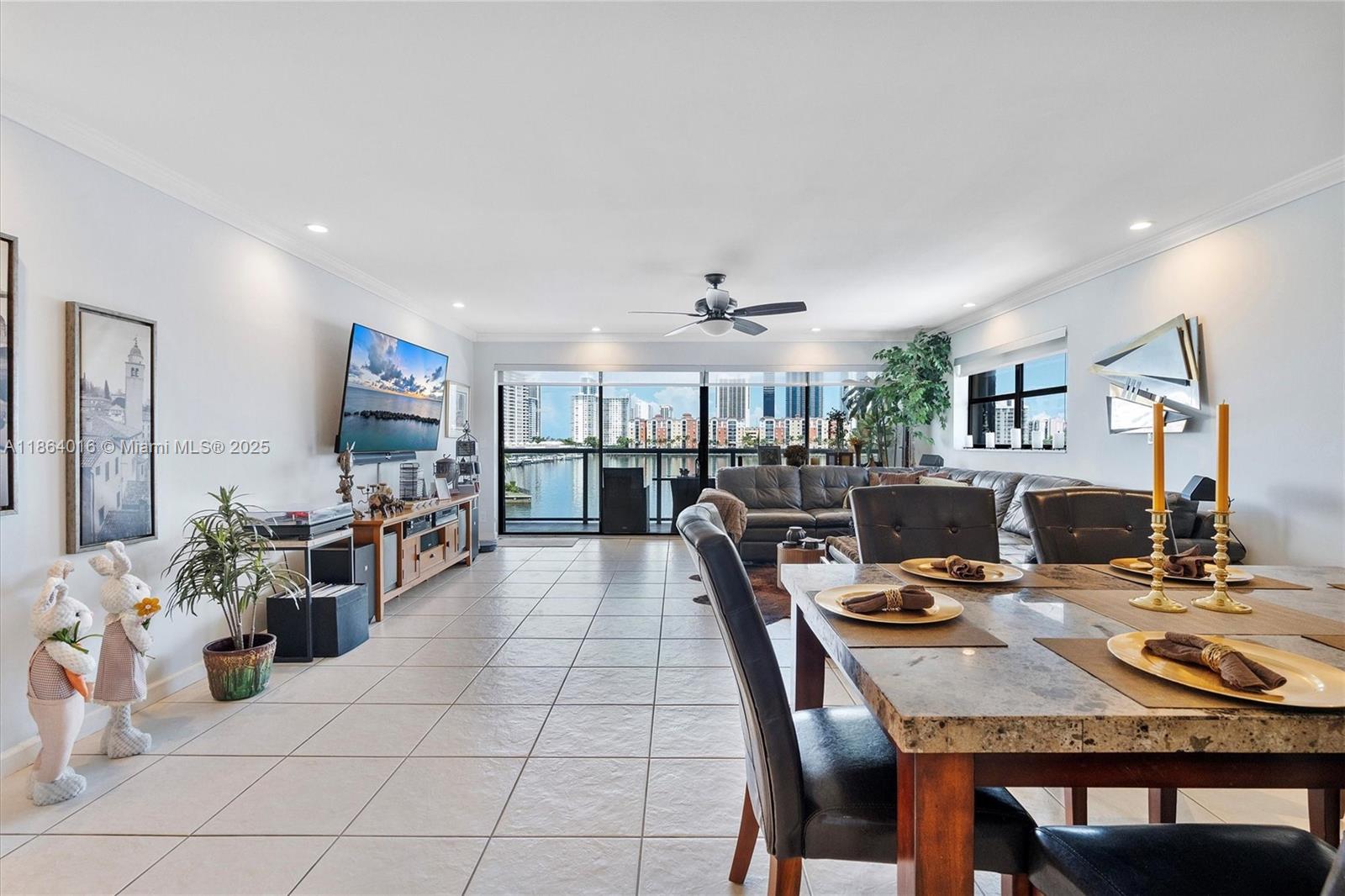 4000 Northeast 168th Street, Unit PH5A North Miami Beach, FL 33160 - Photo 2 of 33 a view of a dining room with furniture