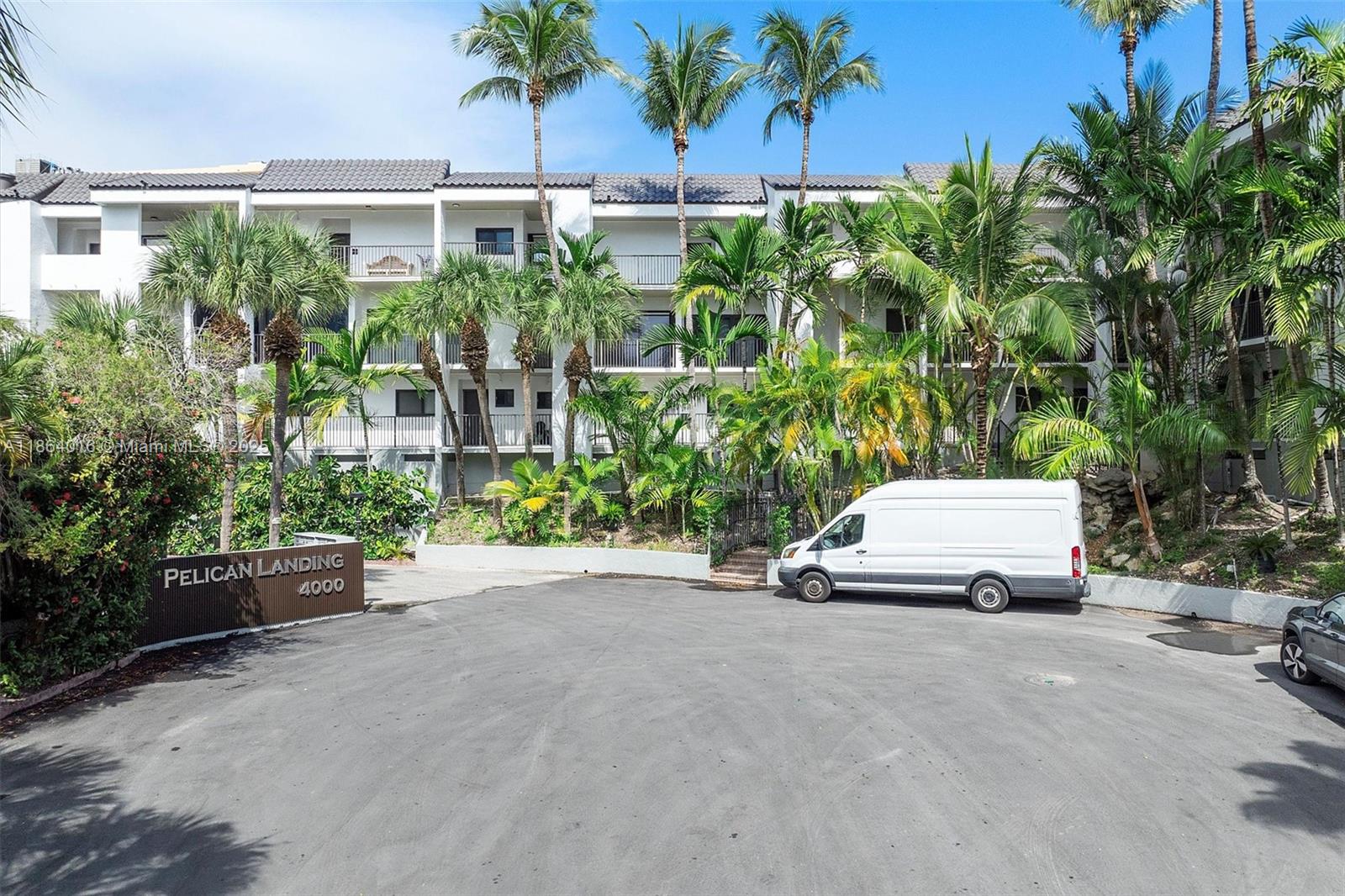 4000 Northeast 168th Street, Unit PH5A North Miami Beach, FL 33160 - Photo 28 of 33 a car parked in front of a building