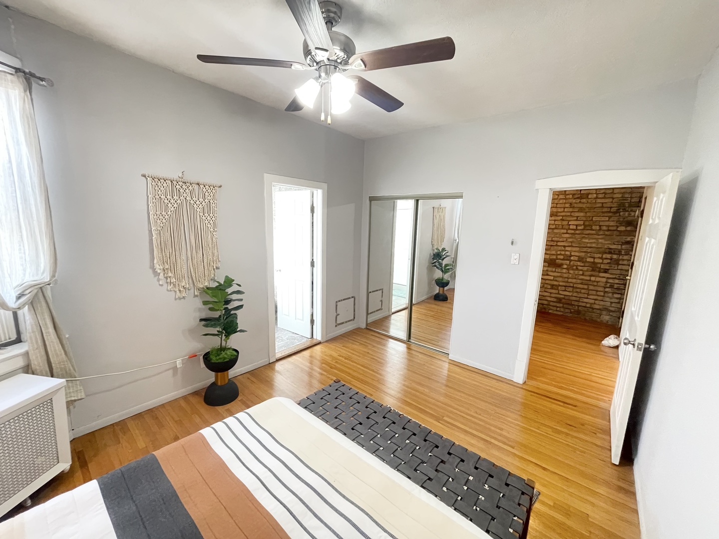 2810 West Logan Boulevard, Unit 3W Chicago, IL 60647 - Photo 13 of 34 a living room with furniture and wooden floor