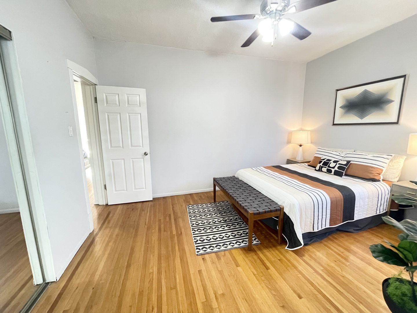 2810 West Logan Boulevard, Unit 3W Chicago, IL 60647 - Photo 16 of 34 a bedroom with two beds and wooden floor