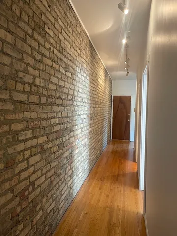 a bathroom with a sink a toilet a mirror and vanity