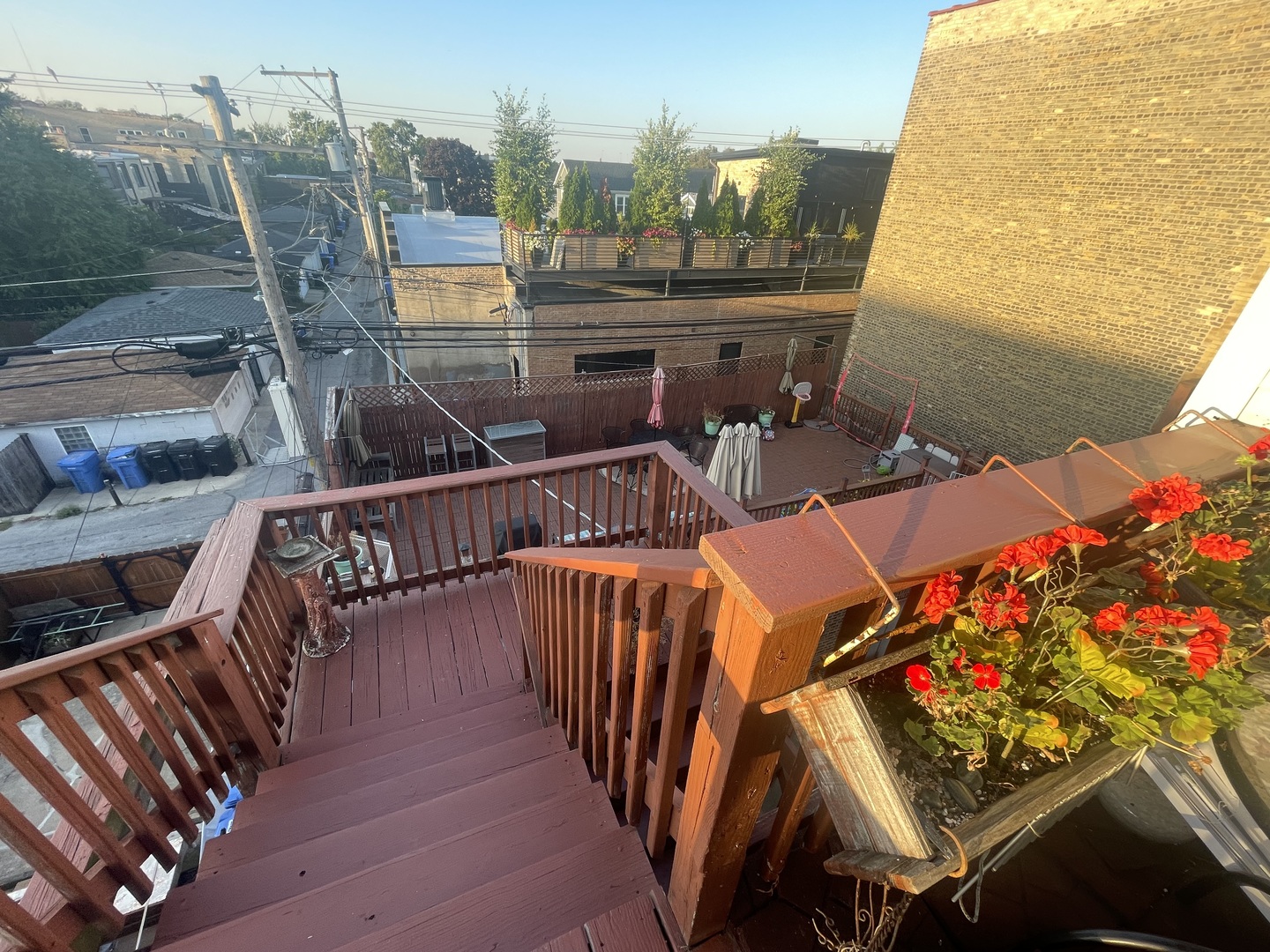 2810 West Logan Boulevard, Unit 3W Chicago, IL 60647 - Photo 32 of 34 a terrace with outdoor seating and city view