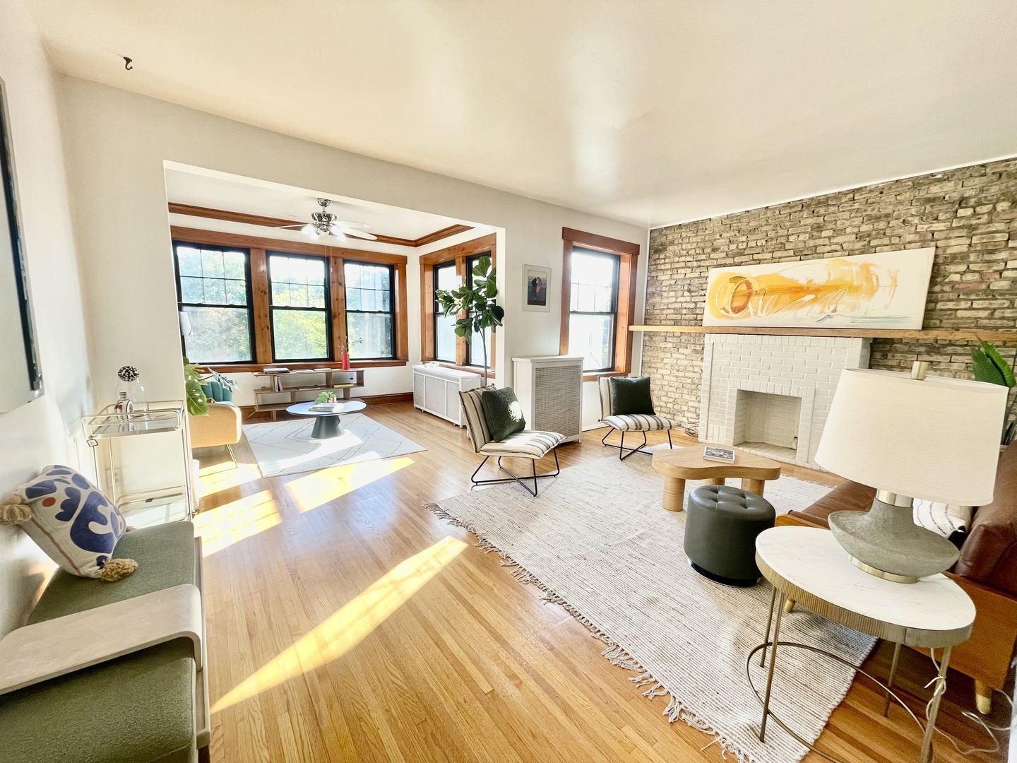 2810 West Logan Boulevard, Unit 3W Chicago, IL 60647 - Photo 5 of 34 a living room with furniture and a fireplace