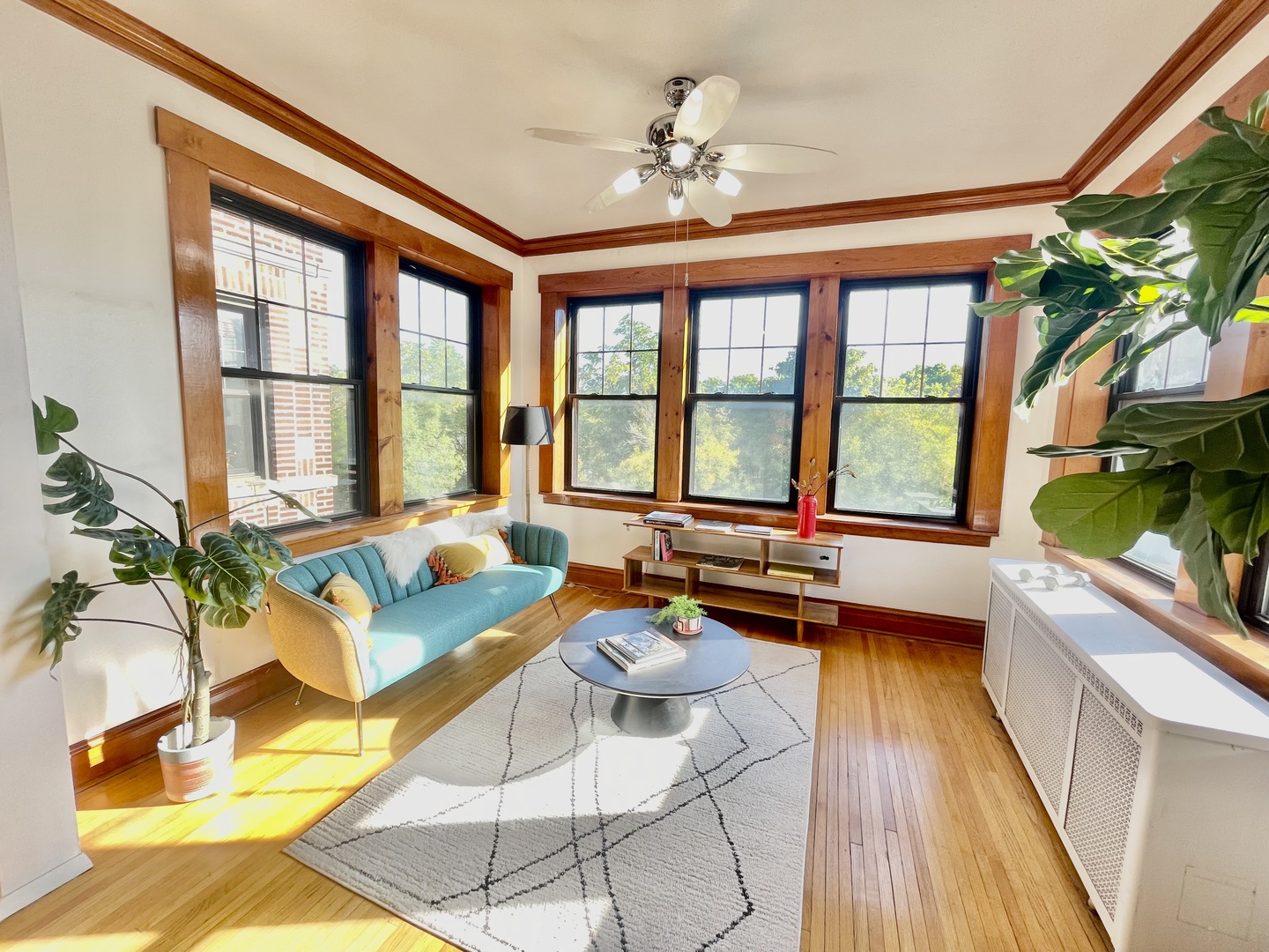 2810 West Logan Boulevard, Unit 3W Chicago, IL 60647 - Photo 7 of 34 a living room with furniture and a large window