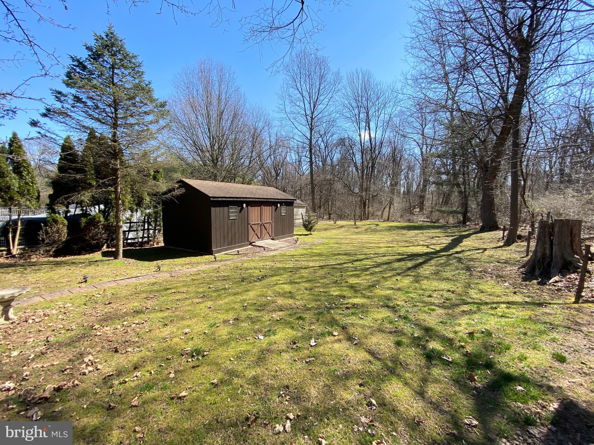 2225 Mill Road Upper Chichester, PA 19061 - Photo 13 of 26 Yard adjacent to 17 acres of wooded Twp property