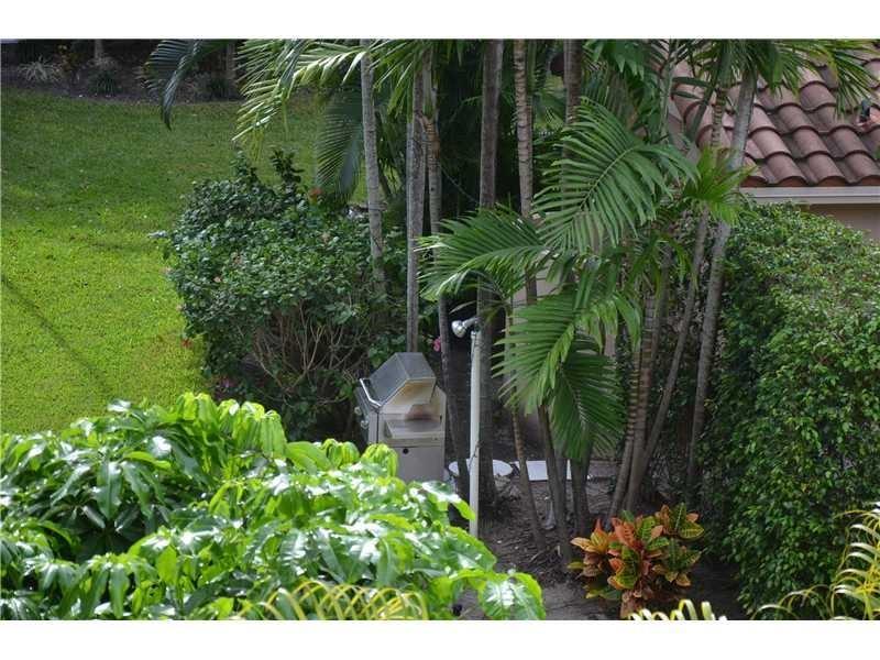 1481 South Ocean Boulevard, Unit 332C Pompano Beach, FL 33062 - Photo 14 of 24 a view of a garden