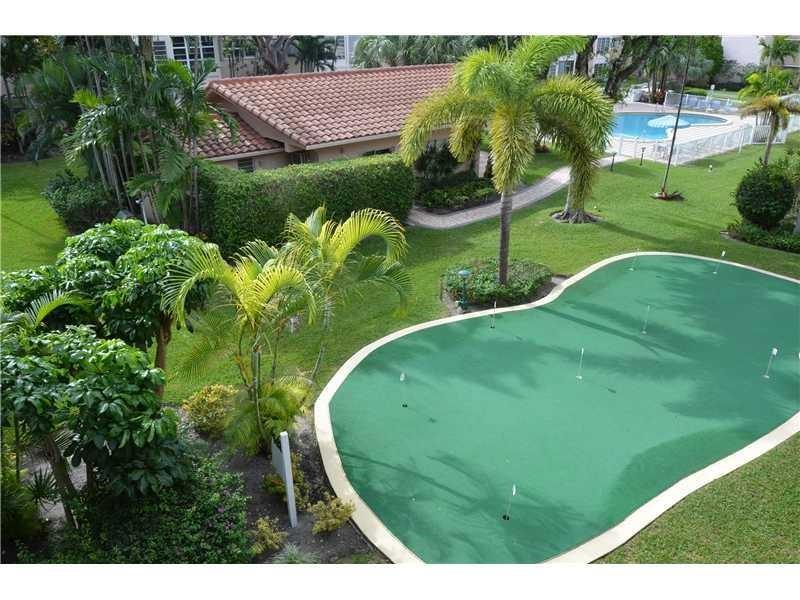1481 South Ocean Boulevard, Unit 332C Pompano Beach, FL 33062 - Photo 15 of 24 a view of a wooden fence