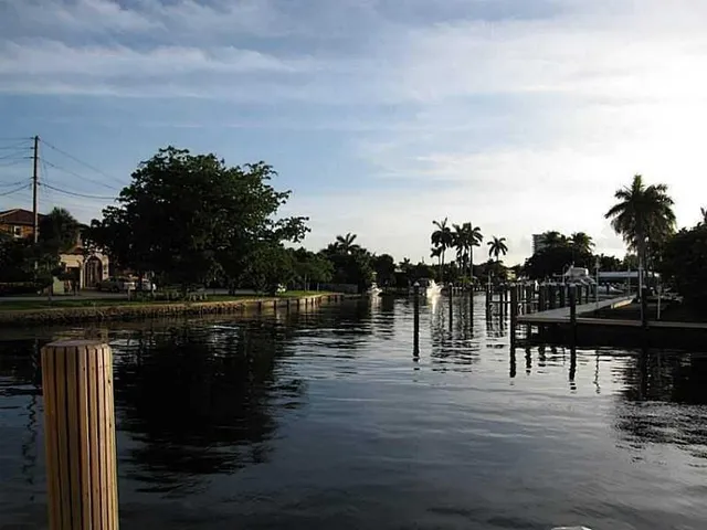 a view of a lake with a house