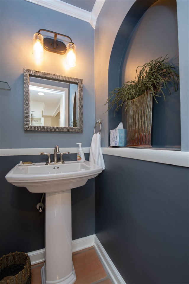 4716 Spring Creek Road Rockford, IL 61114 - Photo 16 of 50 a bathroom with a sink and a mirror