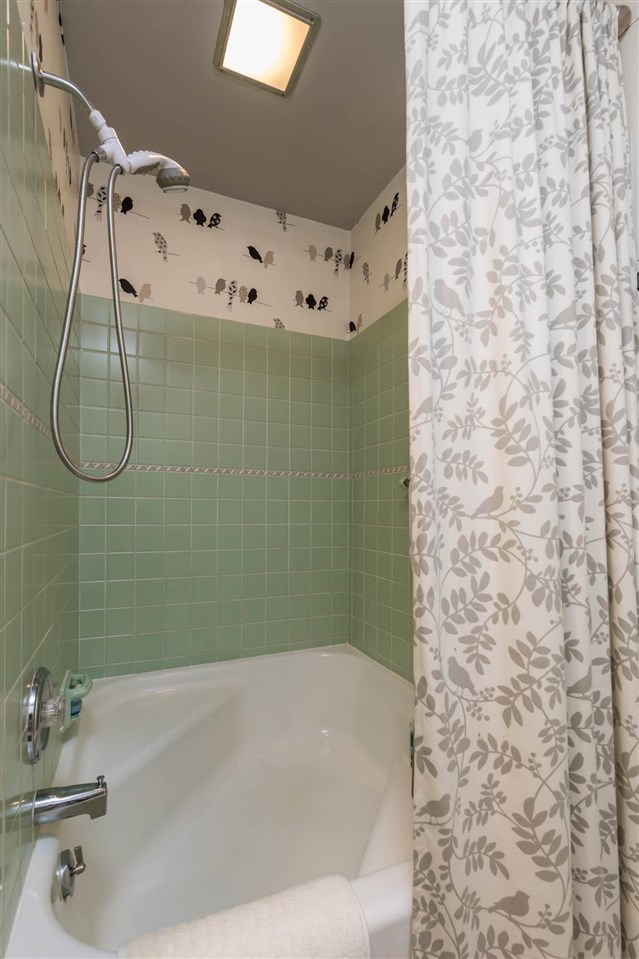 4716 Spring Creek Road Rockford, IL 61114 - Photo 26 of 50 a bathroom with a bathtub and shower