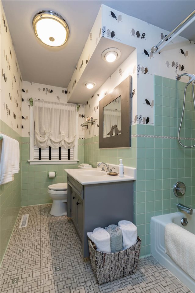 4716 Spring Creek Road Rockford, IL 61114 - Photo 27 of 50 a bathroom with a sink toilet and shower