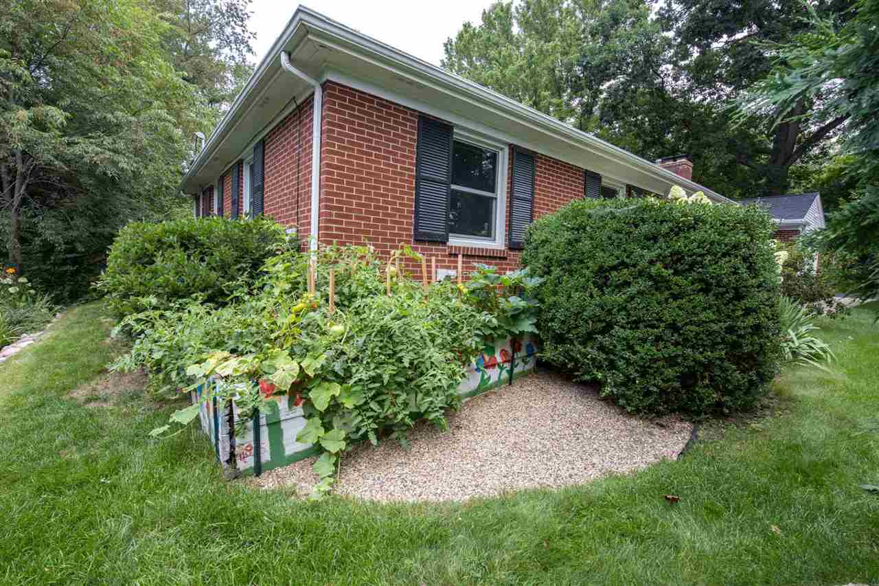4716 Spring Creek Road Rockford, IL 61114 - Photo 42 of 50 a view of bushes and garden