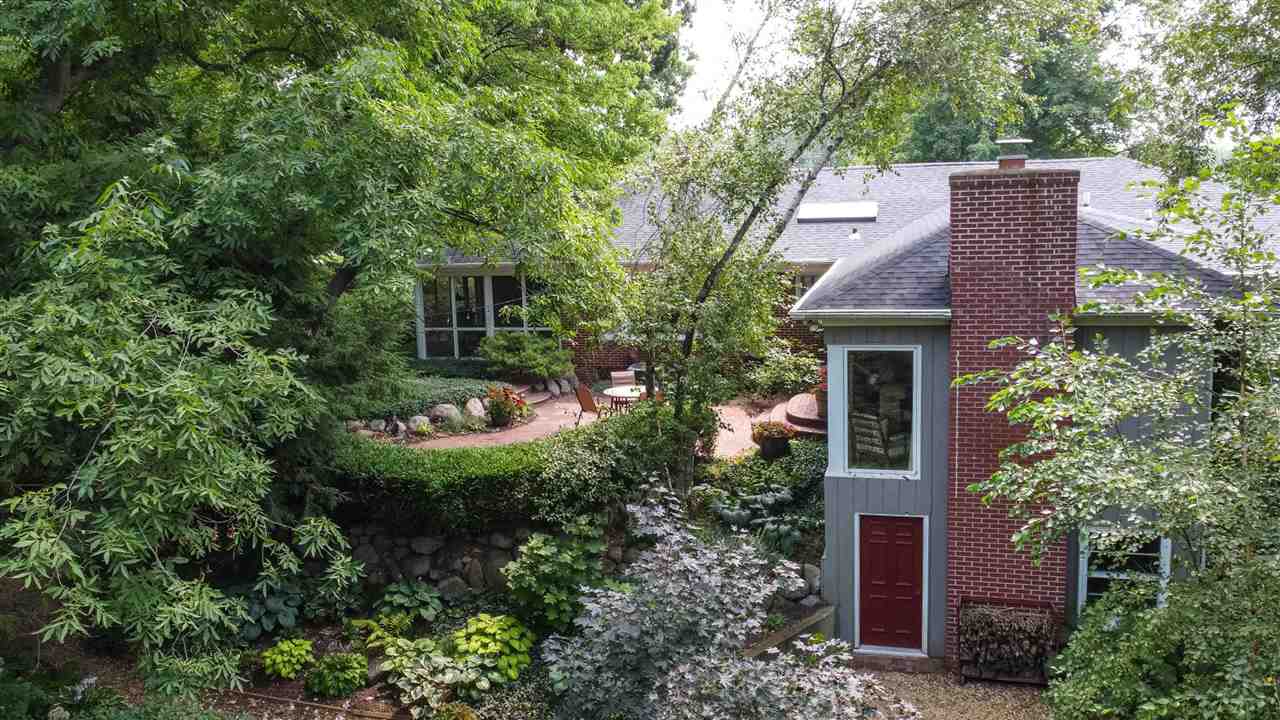 4716 Spring Creek Road Rockford, IL 61114 - Photo 47 of 50 a front view of a house with garden