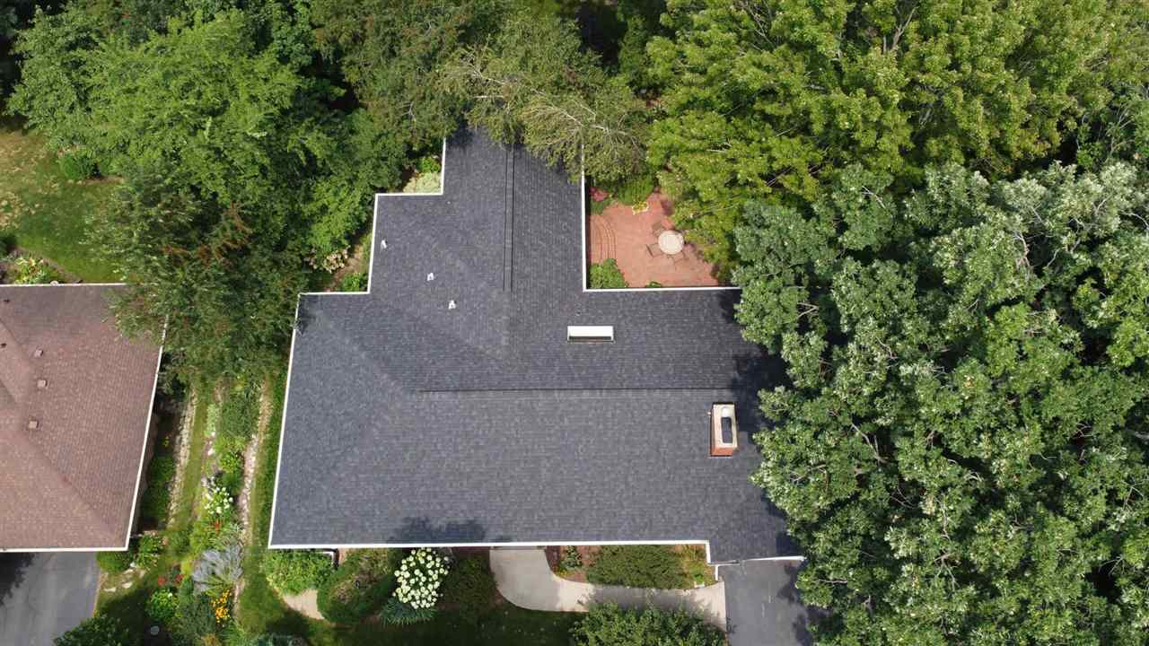 4716 Spring Creek Road Rockford, IL 61114 - Photo 48 of 50 an aerial view of a house with yard and outdoor seating