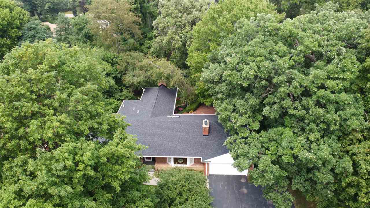 4716 Spring Creek Road Rockford, IL 61114 - Photo 49 of 50 an aerial view of a house with a yard