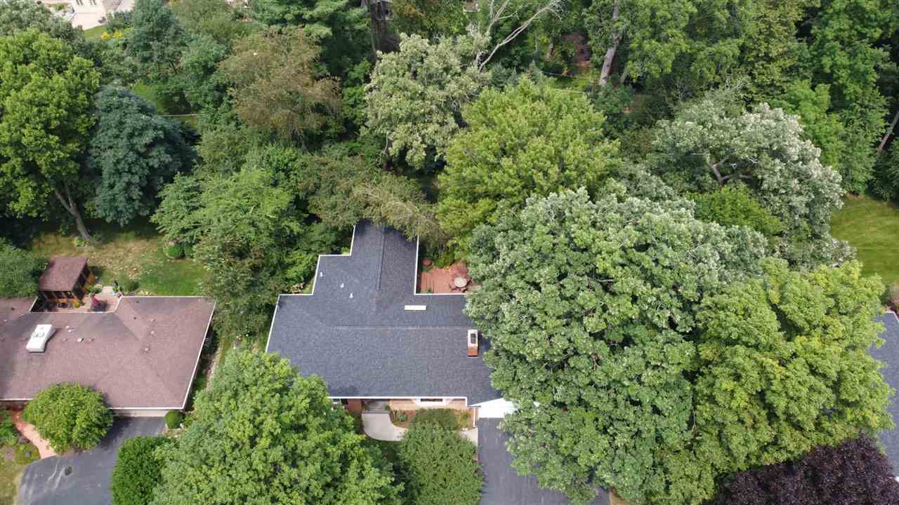 4716 Spring Creek Road Rockford, IL 61114 - Photo 50 of 50 an aerial view of a house with a yard
