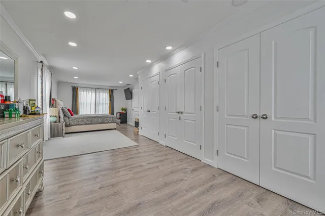 a bathroom with a sink a vanity and shower