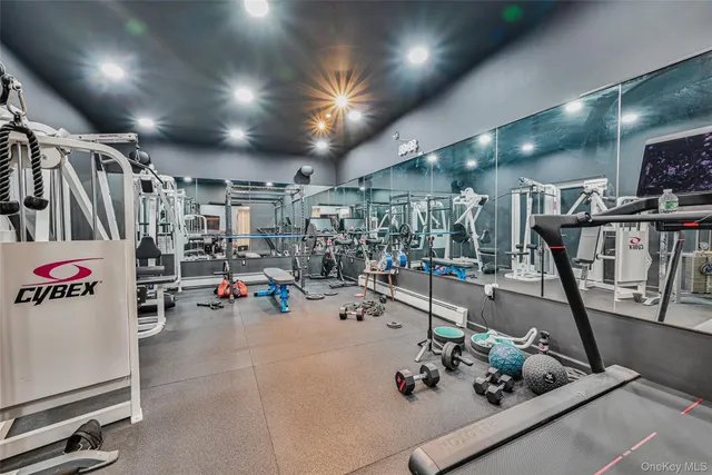 a bathroom with a sink a toilet and a shower curtain