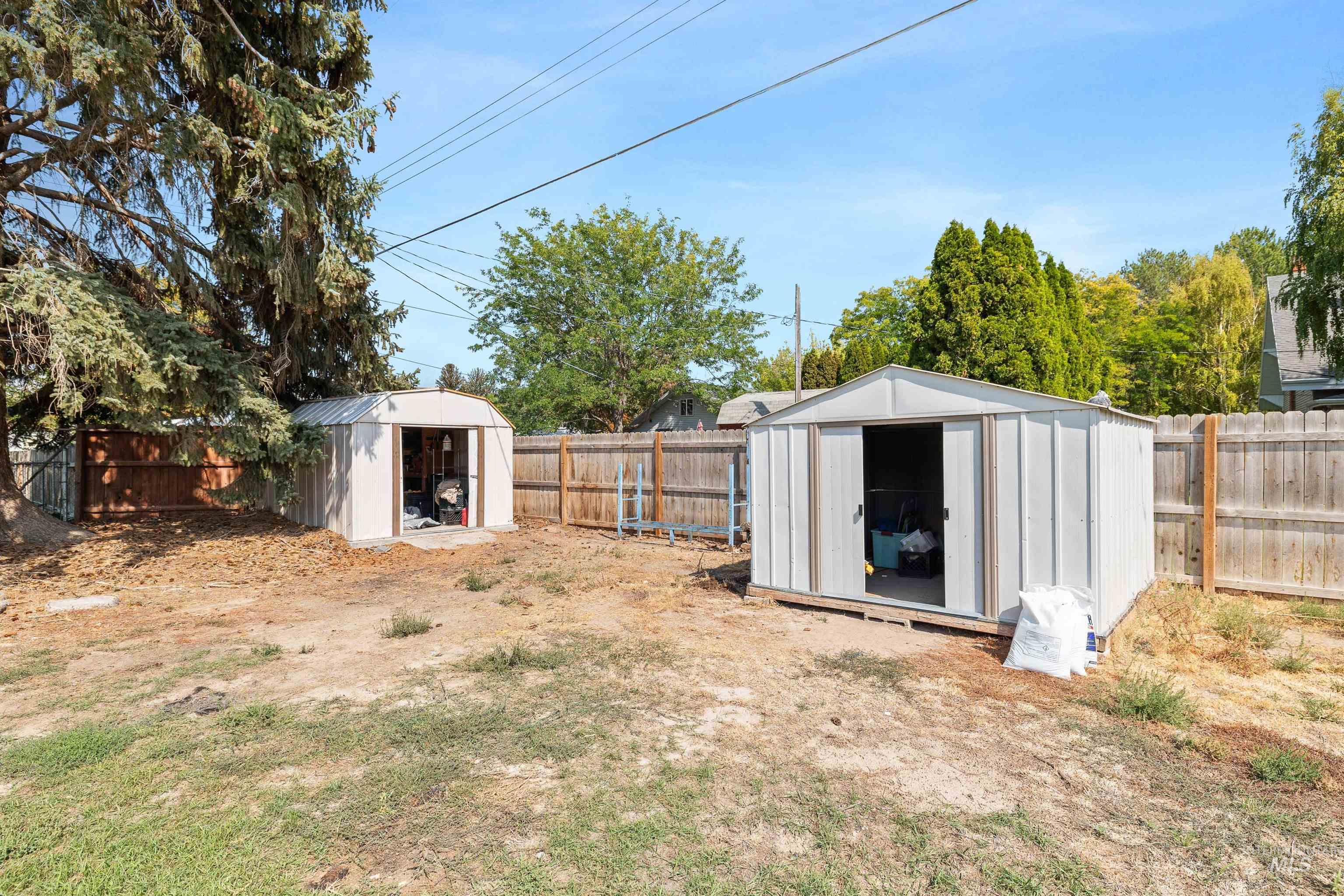 817 Union Avenue Filer, ID 83328 - Photo 25 of 37 Fenced backyard featuring a storage shed