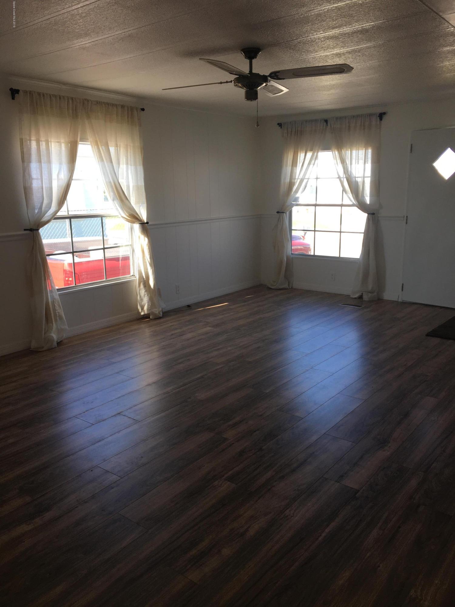 2510 Amberly Road Northeast Palm Bay, FL 32905 - Photo 15 of 20 Living Room