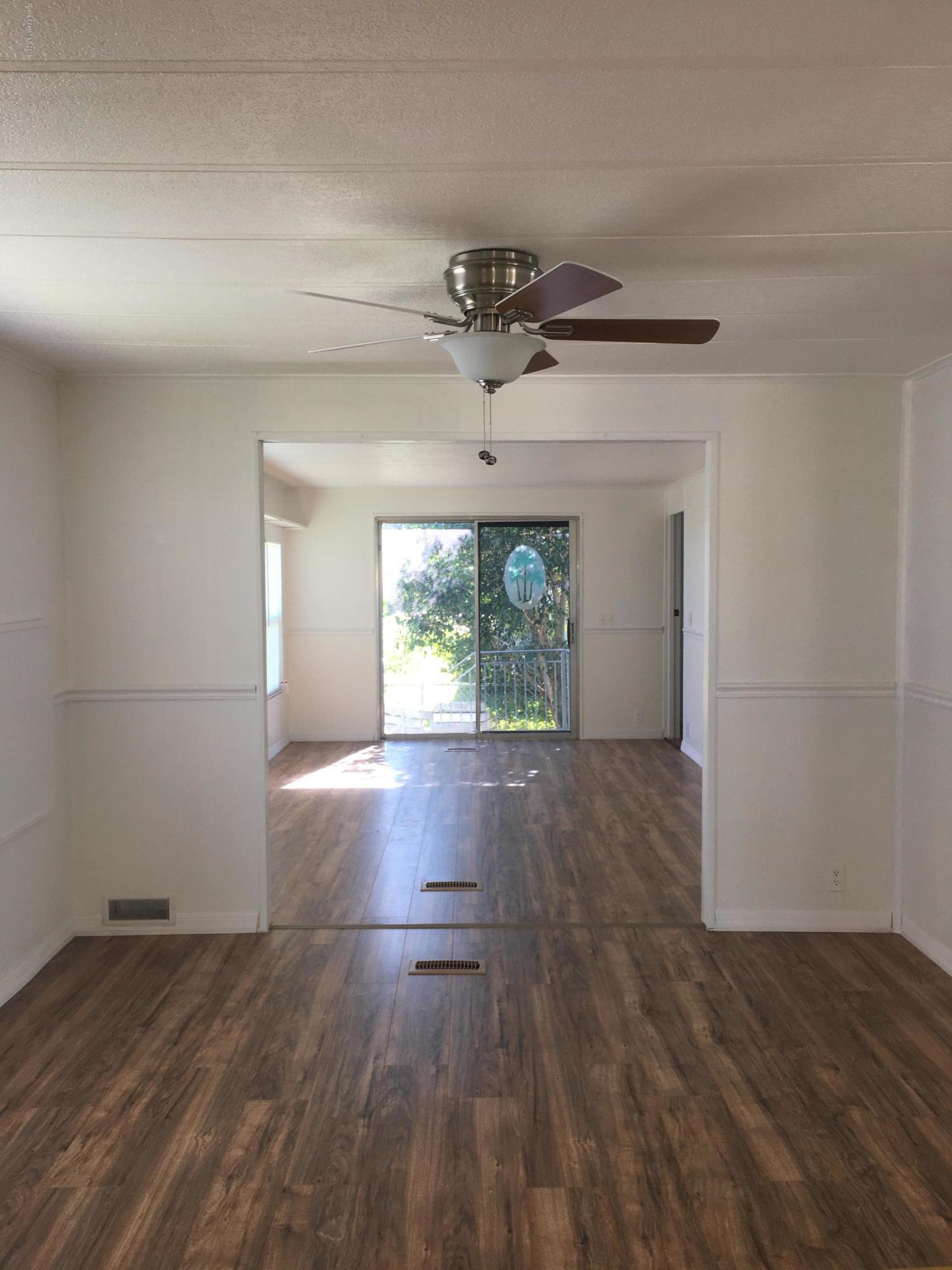 2510 Amberly Road Northeast Palm Bay, FL 32905 - Photo 18 of 20 Dining into 2nd Living Rm