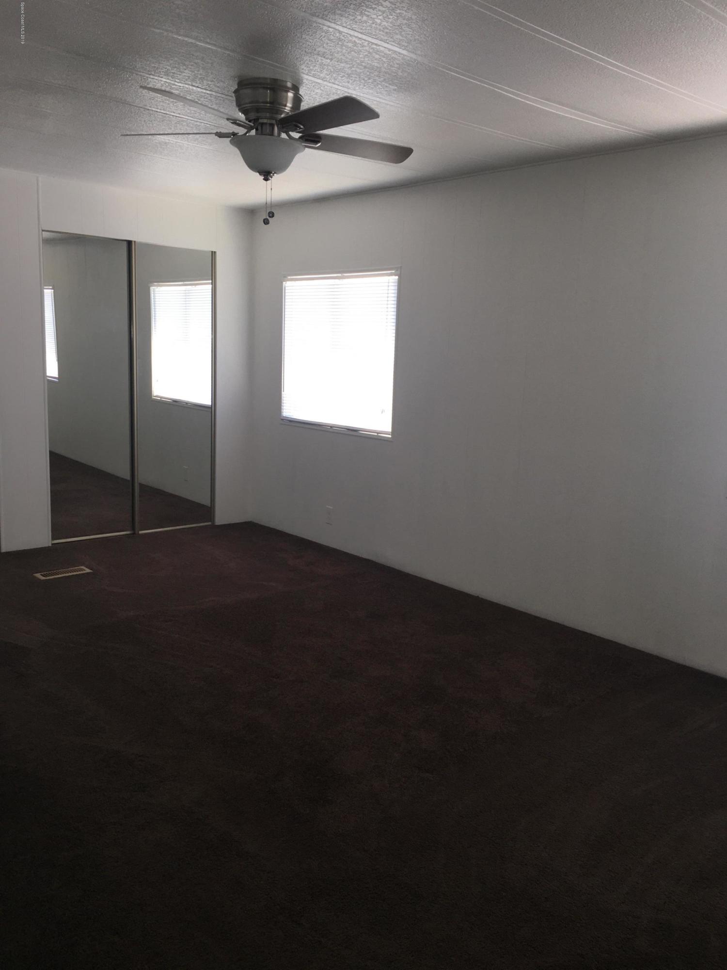 2510 Amberly Road Northeast Palm Bay, FL 32905 - Photo 7 of 20 Master Bedroom