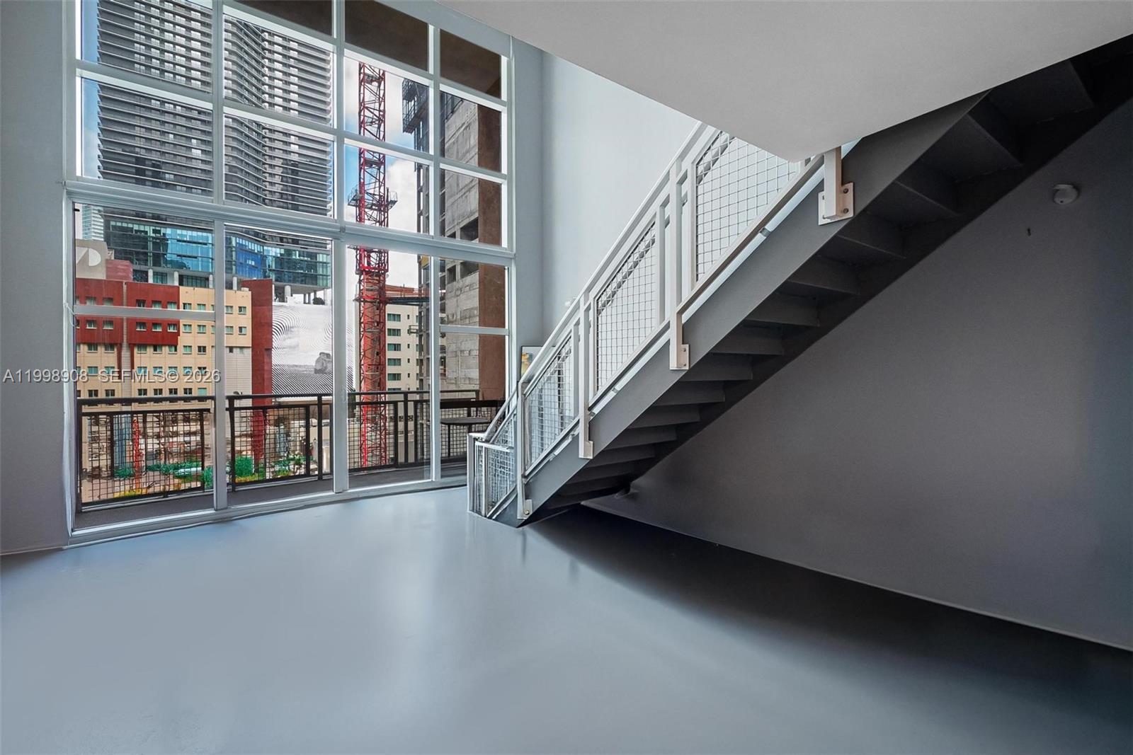 244 Biscayne Boulevard, Unit 445 Miami, FL 33132 - Photo 16 of 35 a view of an entryway with a stairs