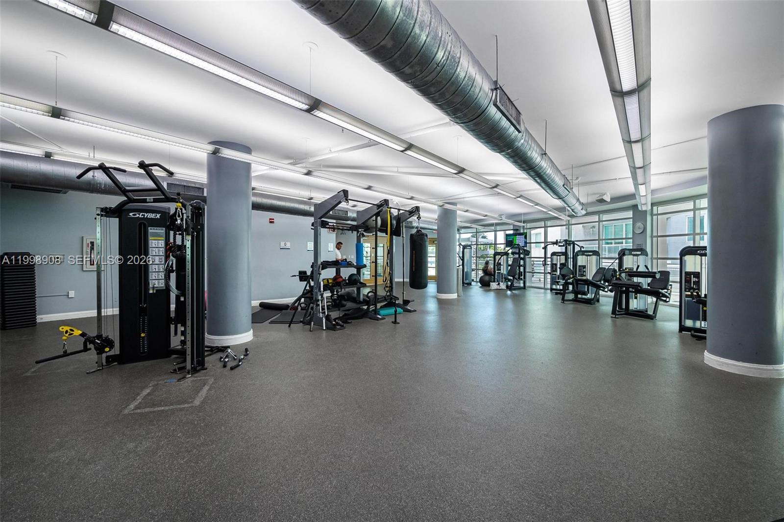 244 Biscayne Boulevard, Unit 445 Miami, FL 33132 - Photo 29 of 35 a view of a room with gym equipment