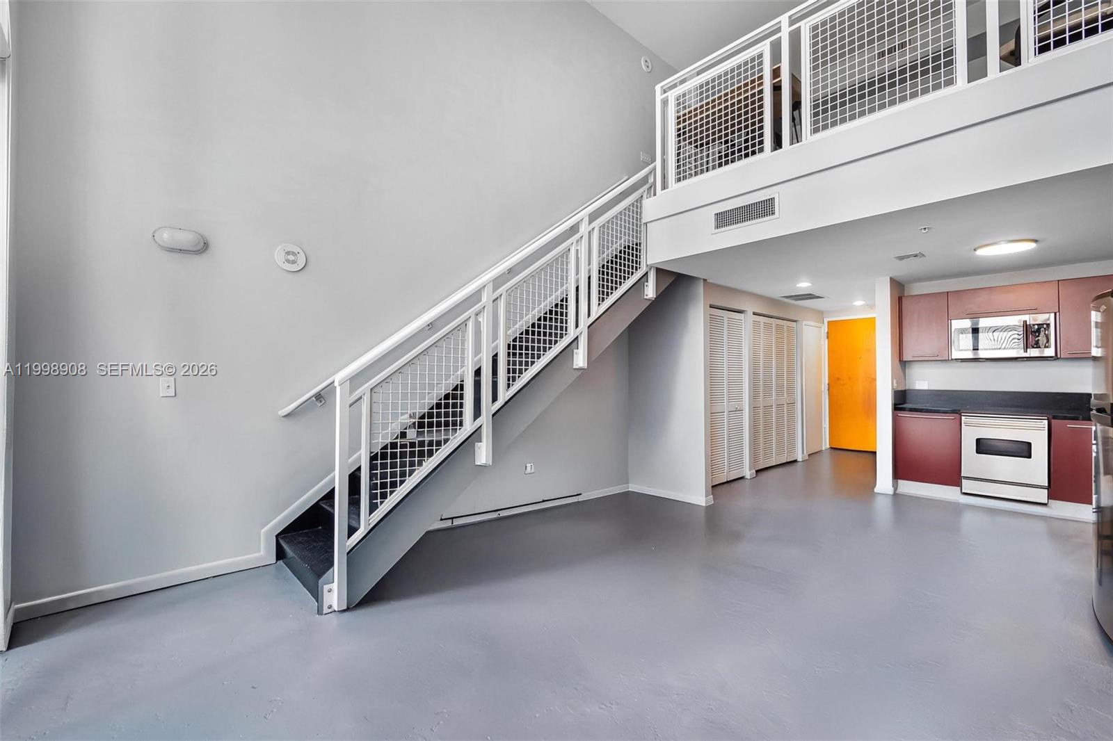 244 Biscayne Boulevard, Unit 445 Miami, FL 33132 - Photo 8 of 35 a view of an entryway with stairs