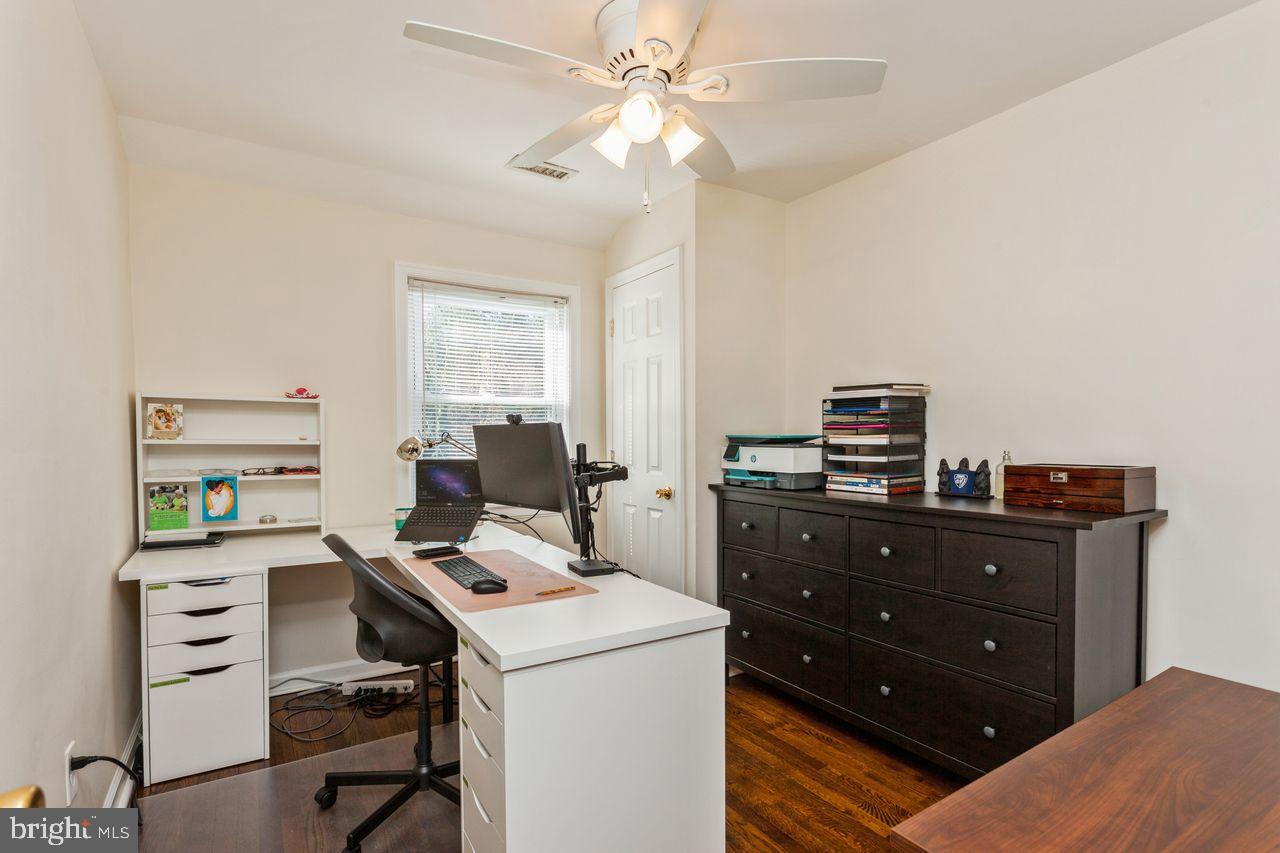 3920 Rexmere Road Baltimore, MD 21218 - Photo 21 of 35 a room with a desk and a window