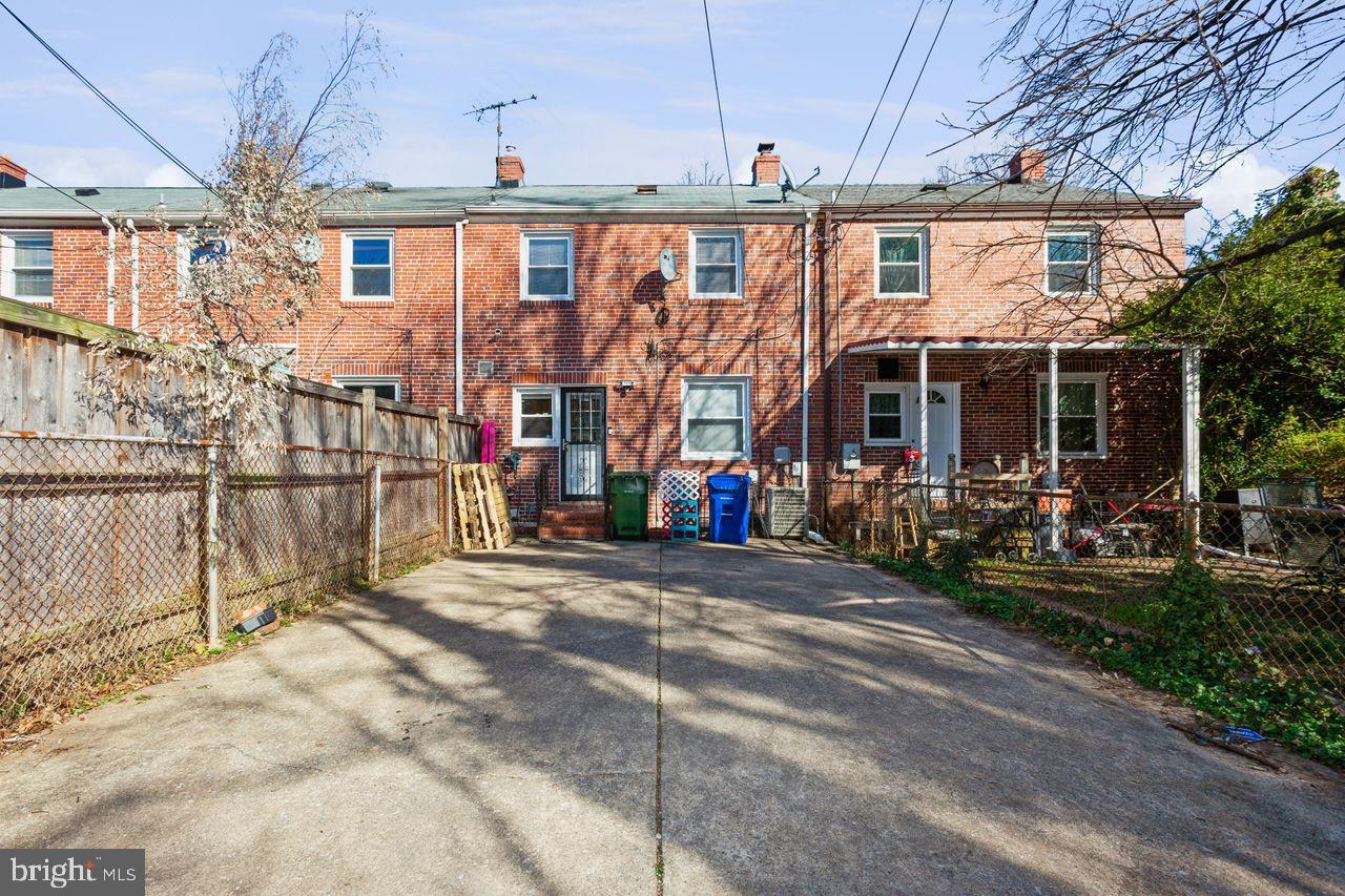 3920 Rexmere Road Baltimore, MD 21218 - Photo 33 of 35 a view of a house with a patio