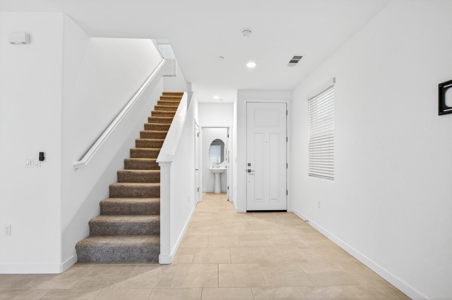 317 Talus Way South Madera, CA 93636 - Photo 23 of 61 a view of an entryway with staircase