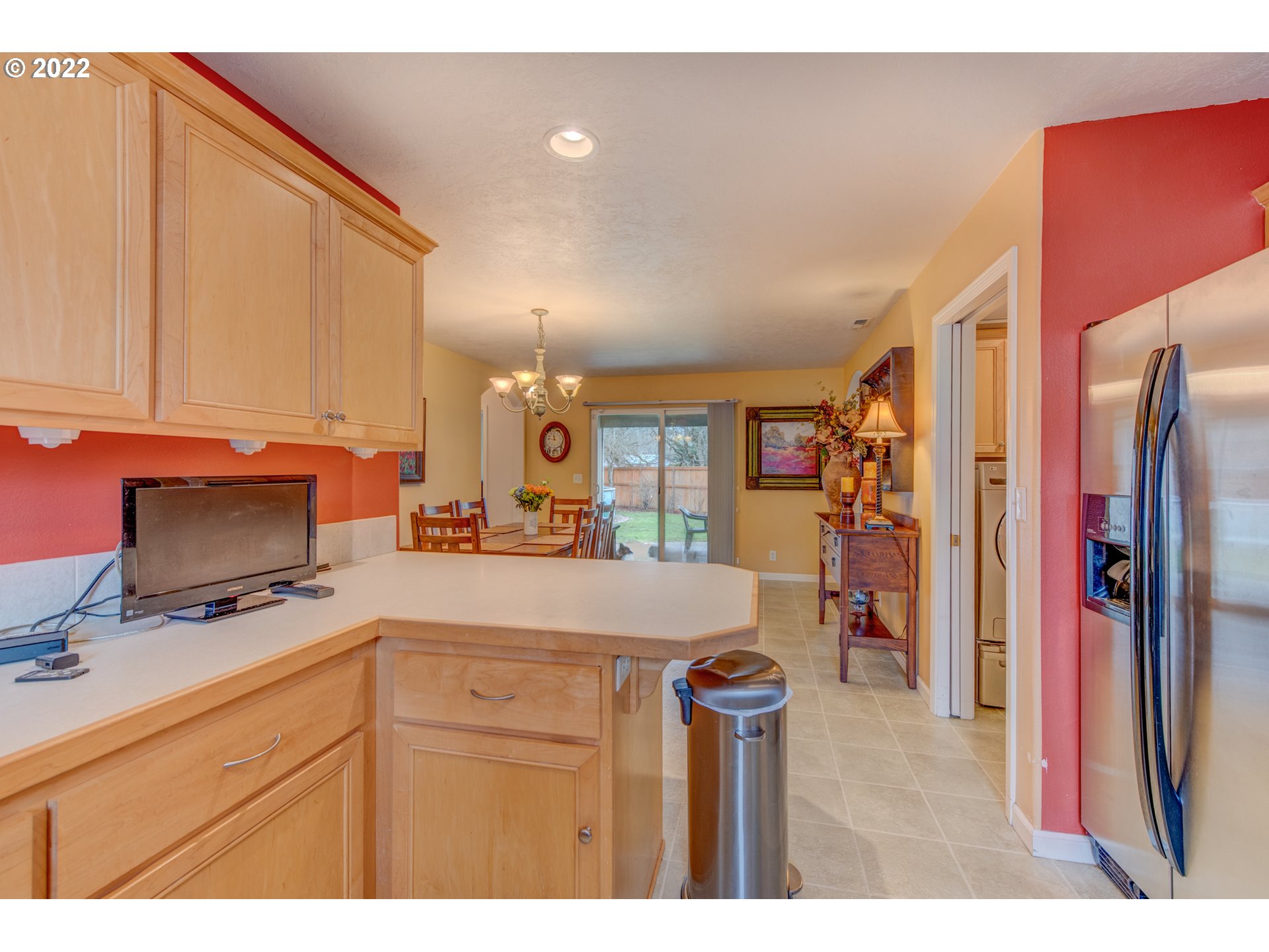 695 62nd Street Springfield, OR 97478 - Photo 12 of 30 a kitchen with stainless steel appliances granite countertop a refrigerator and a stove top oven