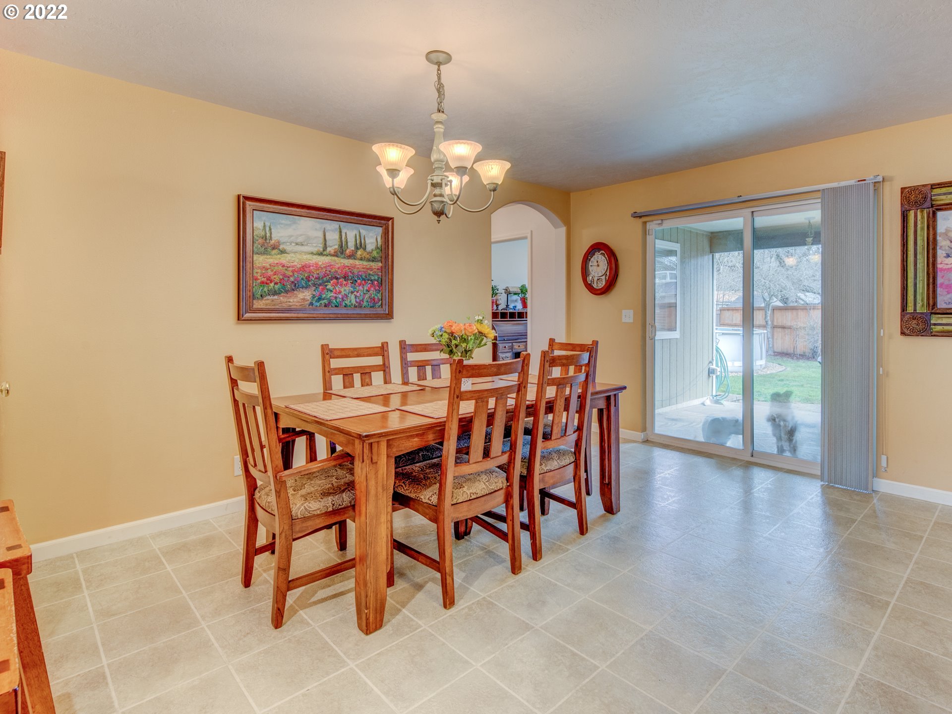 695 62nd Street Springfield, OR 97478 - Photo 13 of 30 a view of a dining room with furniture and a chandelier