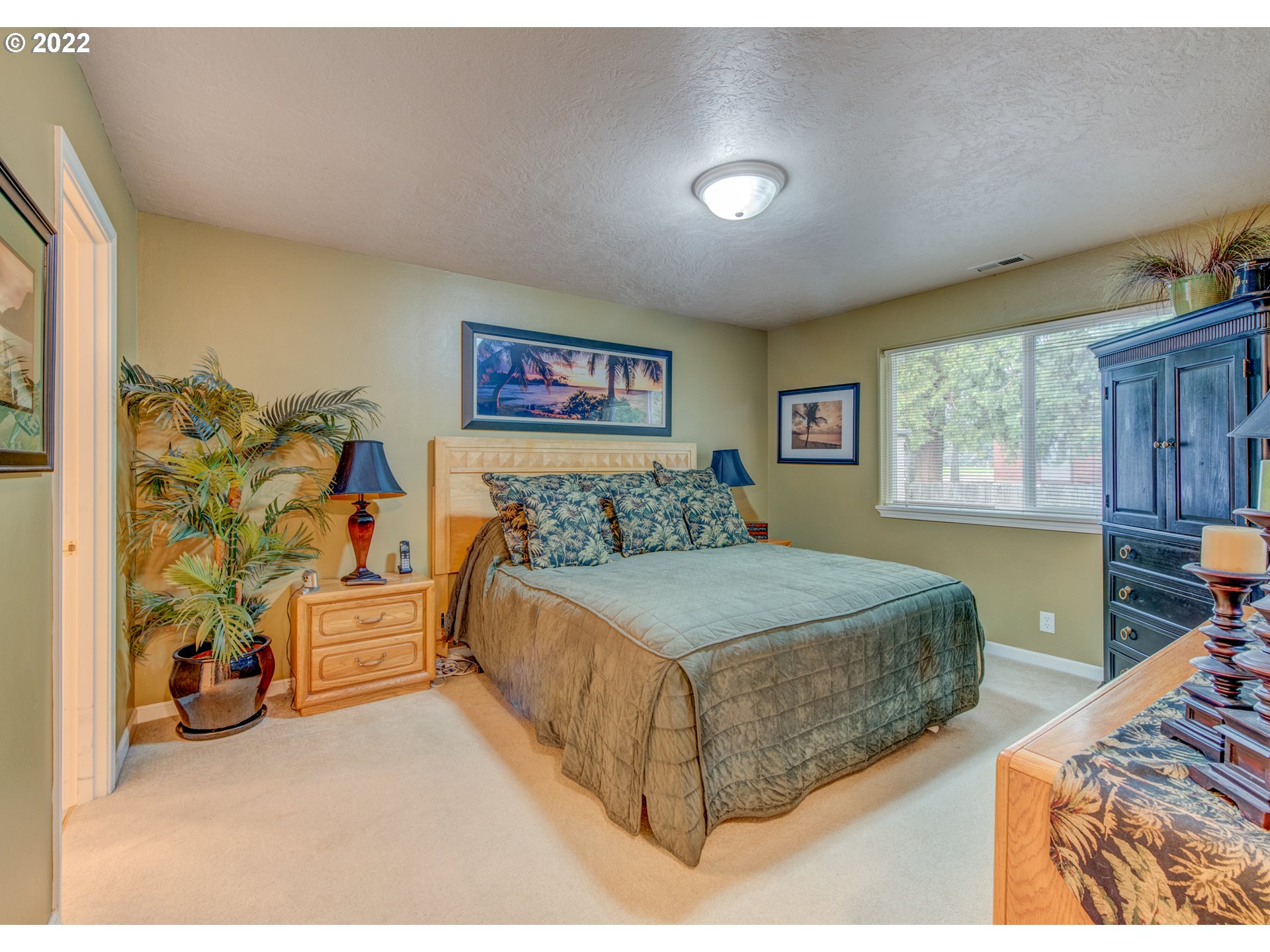695 62nd Street Springfield, OR 97478 - Photo 15 of 30 a bedroom with a bed and a couch