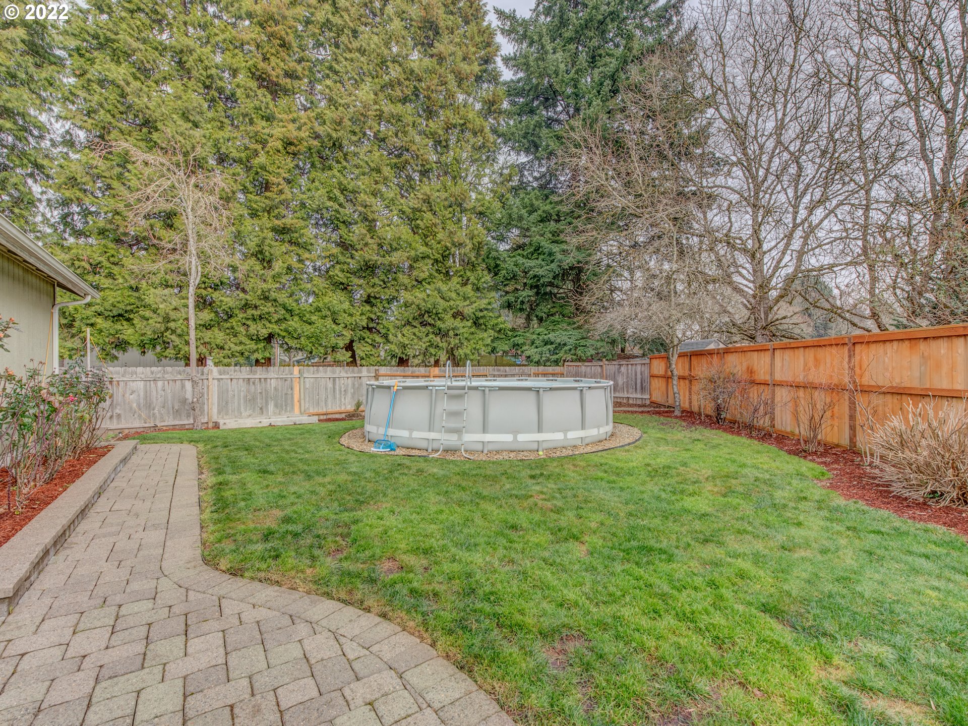 695 62nd Street Springfield, OR 97478 - Photo 26 of 30 a view of a backyard with pathway