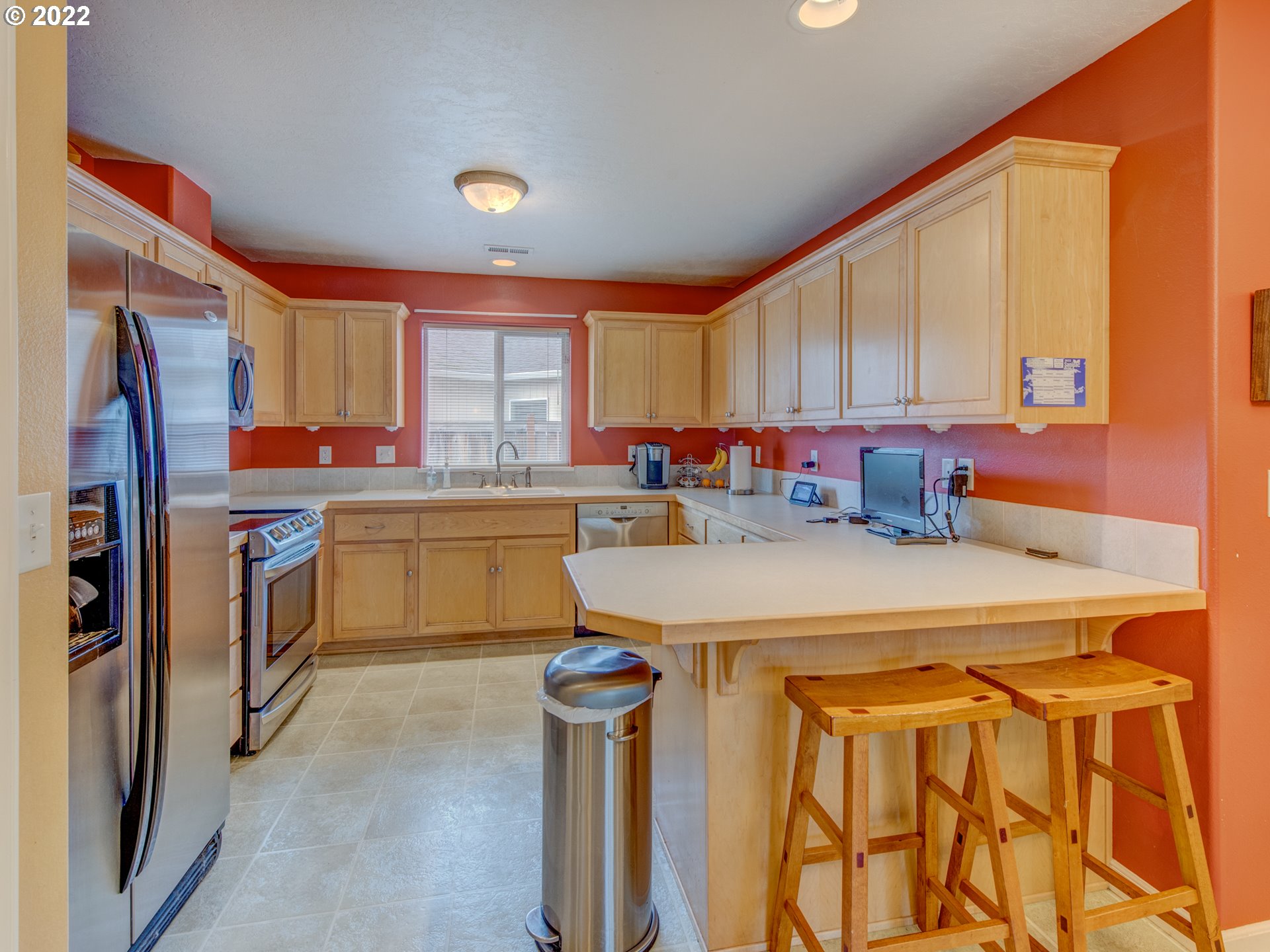695 62nd Street Springfield, OR 97478 - Photo 10 of 30 a kitchen with a sink a stove and cabinets