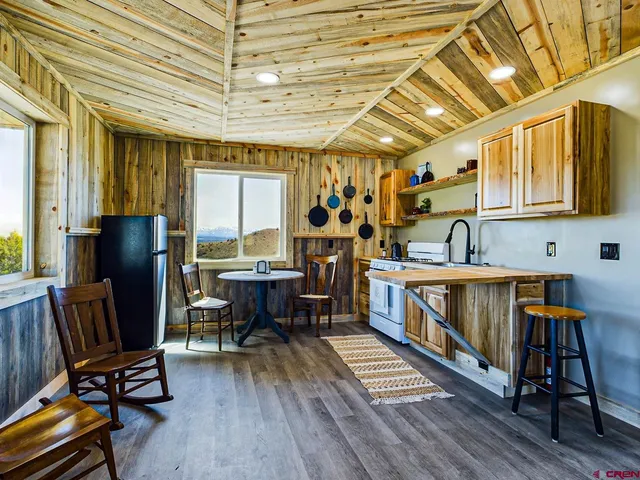 a view of wooden floor with a window