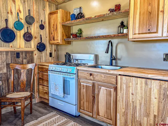 a spacious bathroom with a bathtub and a sink