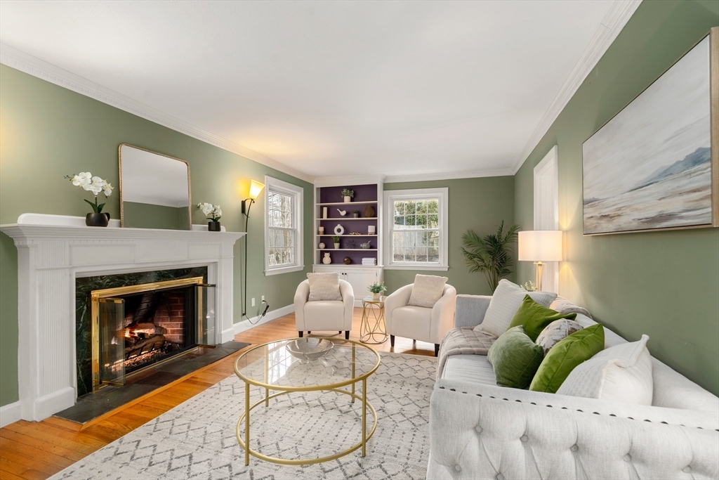 21 Sheldon Road Newton, MA 02459 - Photo 13 of 34 a living room with furniture and a fireplace
