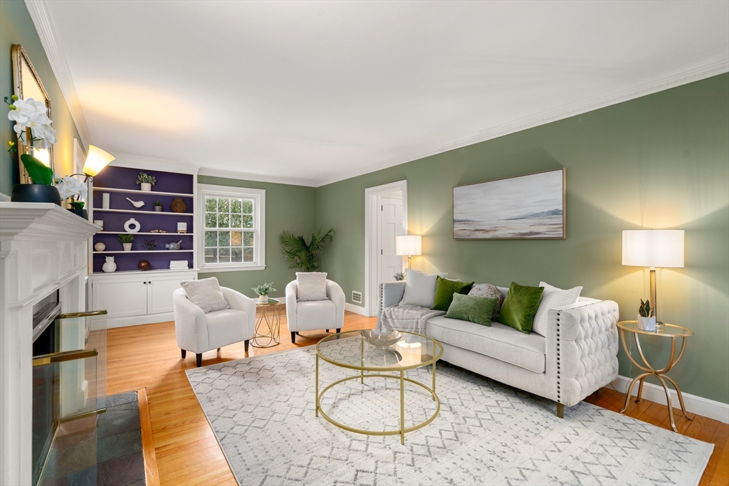 21 Sheldon Road Newton, MA 02459 - Photo 14 of 34 a living room with furniture a rug and a lamp
