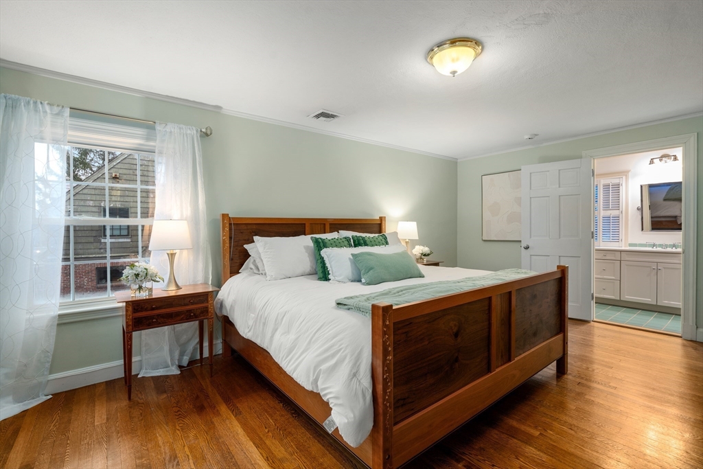 21 Sheldon Road Newton, MA 02459 - Photo 19 of 34 a bed sitting in a spacious bedroom next to a window