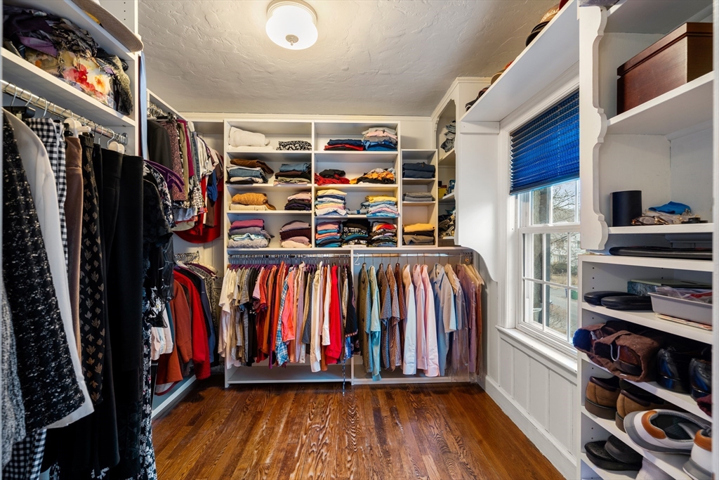 21 Sheldon Road Newton, MA 02459 - Photo 21 of 34 a view of walk in closet with clothes and shoes