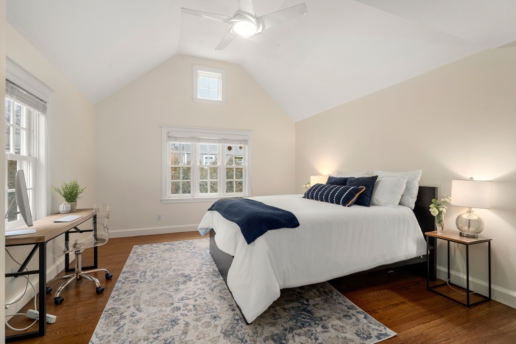 21 Sheldon Road Newton, MA 02459 - Photo 24 of 34 a bedroom with a bed a table and chair