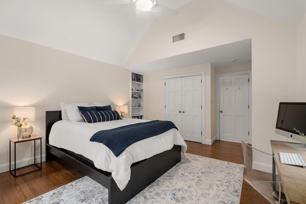 21 Sheldon Road Newton, MA 02459 - Photo 25 of 34 a bedroom with a bed and a flat screen tv