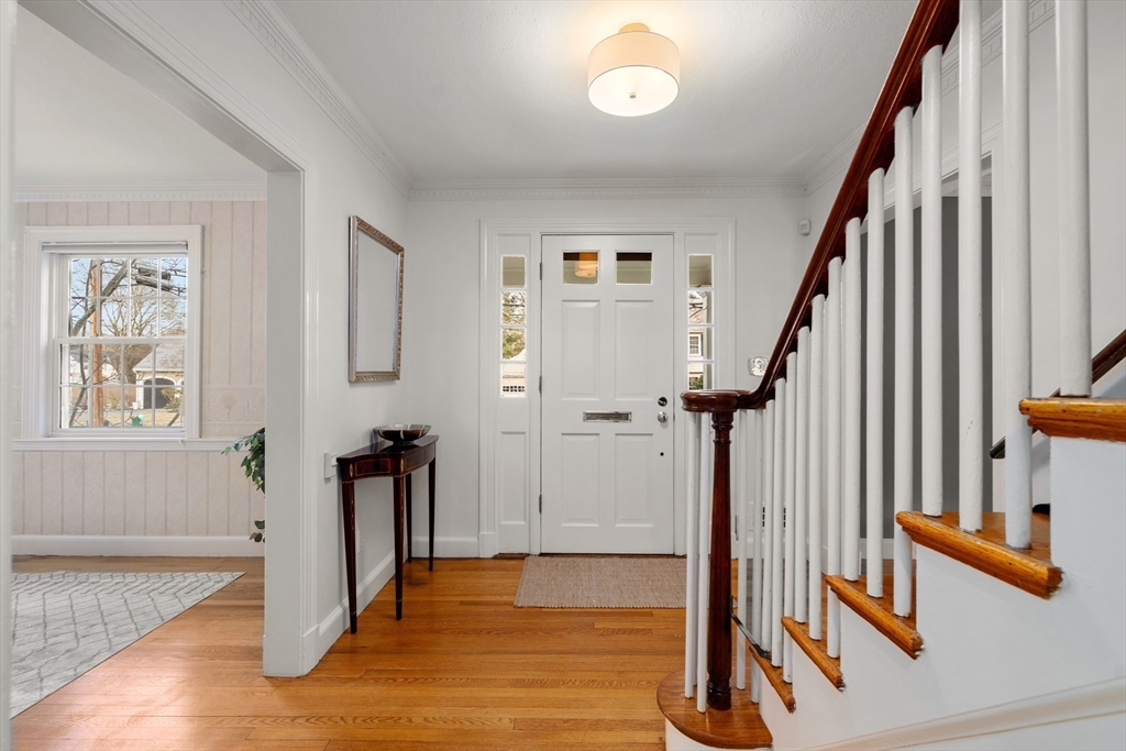 21 Sheldon Road Newton, MA 02459 - Photo 5 of 34 a view of an entryway with wooden floor and livingroom