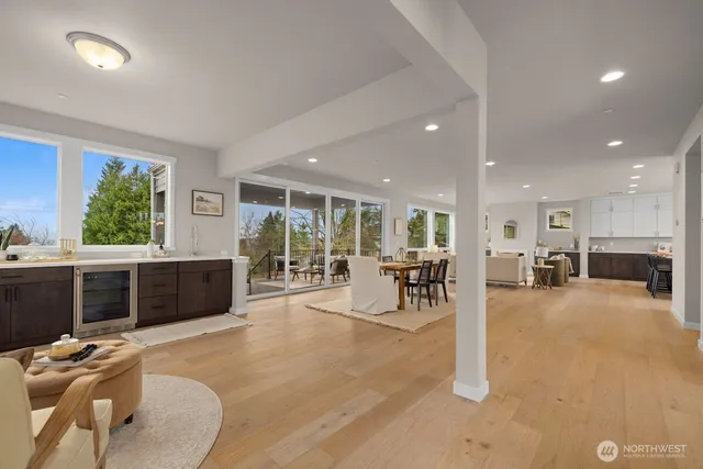 a view of a dining room with furniture window and wooden floor