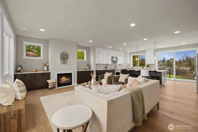 a bathroom with a double vanity sink mirror and shower