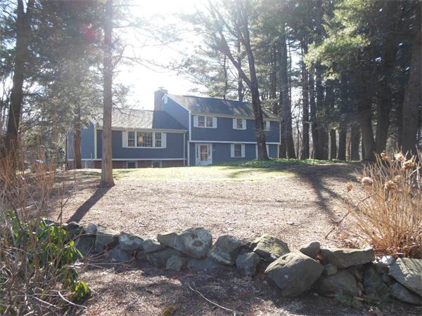 26 Suzanne Road Lexington, MA 02420 - Photo 1 of 11 a view of a yard with a house